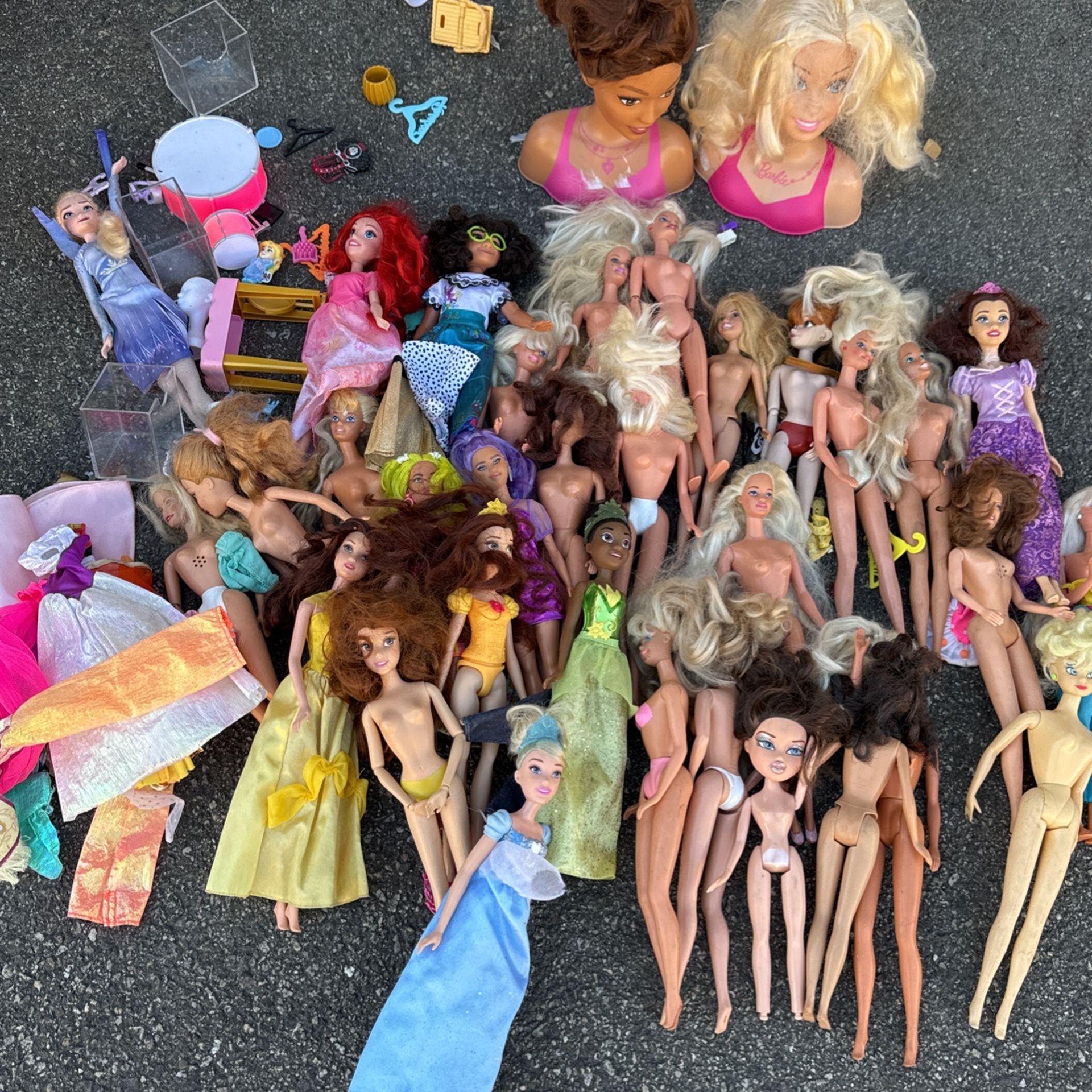 all the barbies and some clothes