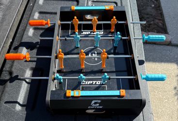 Tabletop foosball game with ball and light