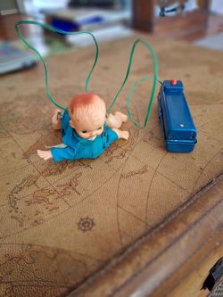 Vintage battery operated crawling baby toy