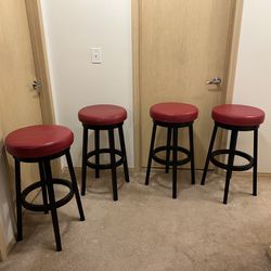 Four Red Bar Stools. Great Condition. 