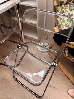 Transparent folded chair
