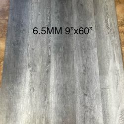 6.5MM 100% WATERPROOF SPC RIGID CORE LUXURY VINYL PLANK LONG 60”PLANK FLOORING WITH PAD ATTACHED. GREAT FOR KIDS AND PETS . ON HAND ! READY 4 Pk Up