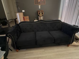 Black Velvet Tufted Sofa with Nailhead Trim