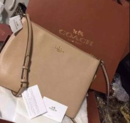 Authentic coach cross body bag NEW with tag comes with the dust and shopping bag including box