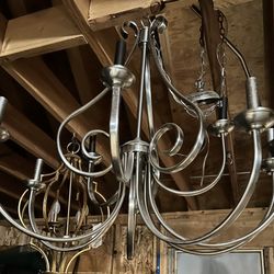 VERY LARGE CHANDELIER TO LIGHT UP ANY ROOM WHILE SERVING AS THE DESIGNER CENTERPIECE ALL GUESTS ARE AMAZED BY! 