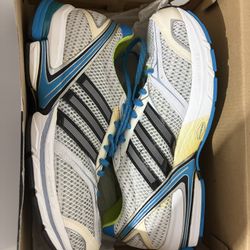 Men Adidas Adizero Tempo 4 athletic sneaker in white , green and blue