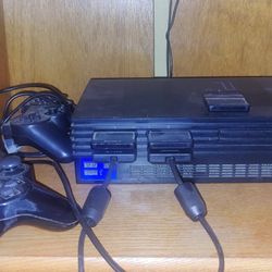 PlayStation 2 with controllers
