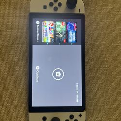 Nintendo Switch Oled with accessories 