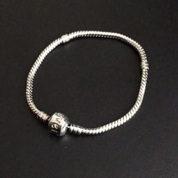 Silver plate bracelet with love bead clasp