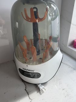 Baby Brezza sterilizer And Dryer.
