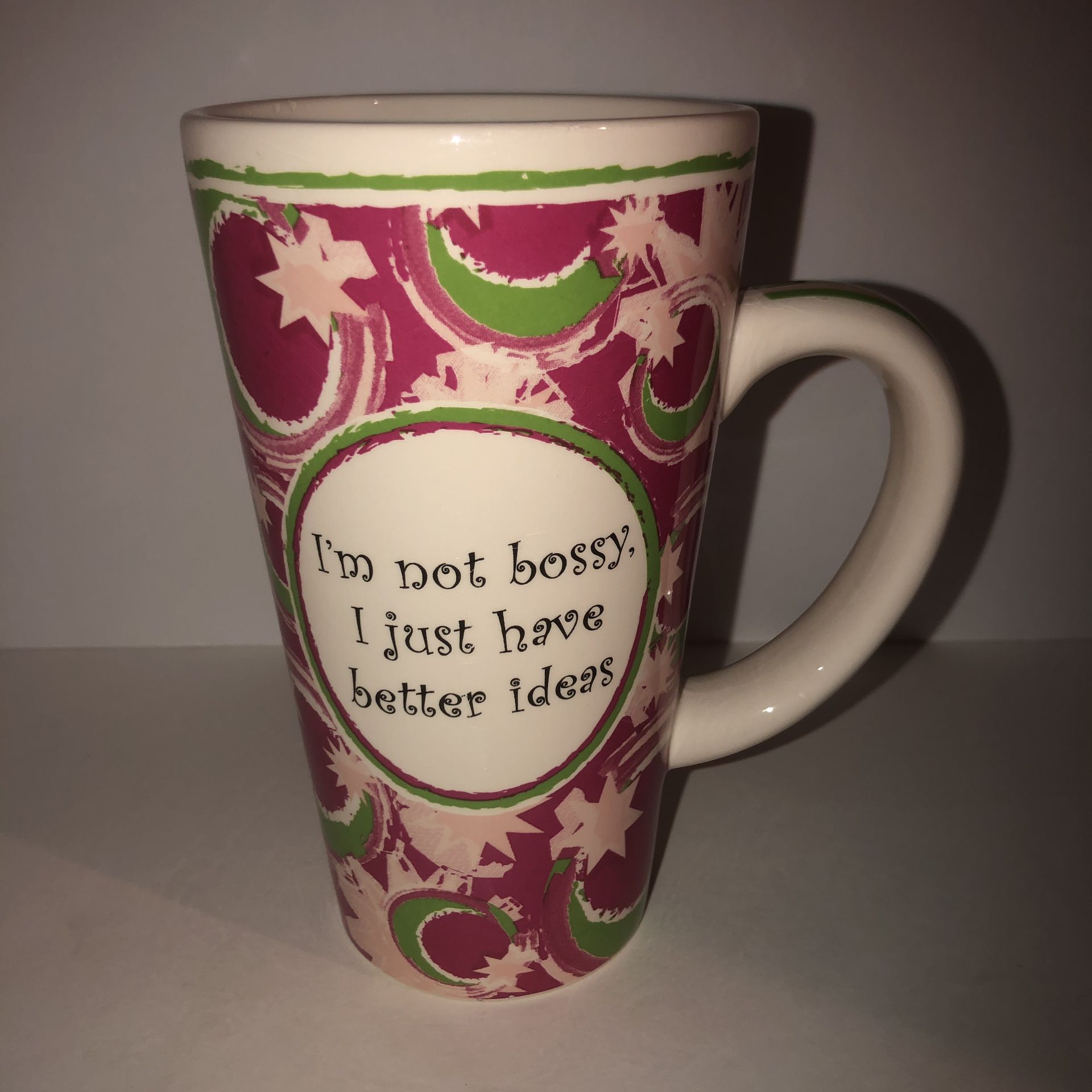 Large coffee/tea pottery ceramic pink/green mug with funny saying. There’sa tiny chip on the rim. Be safe to see all the pictures