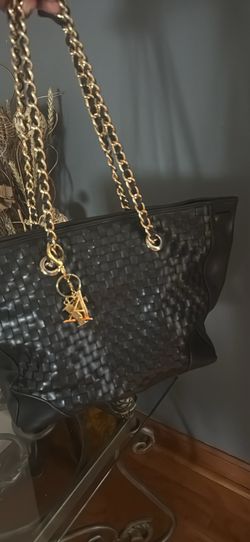 Black woven handbag