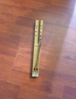Very highly collectible, double twin flute hand painted hand carved made from peru
