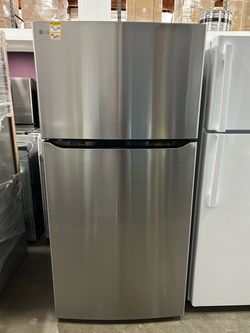 LG refrigerator, model LHTNS2403S, stainless steel finish with top freezer.