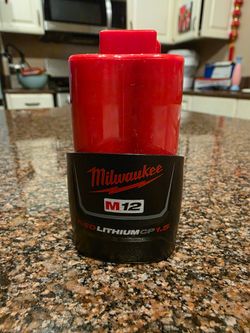 Like new Milwaukee M12 CP1.5 1.5 Ah red lithium ion battery