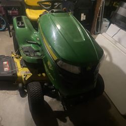 John Deere riding lawnmower