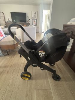 Doona+ Stroller & Car Seat with Latch & Storage