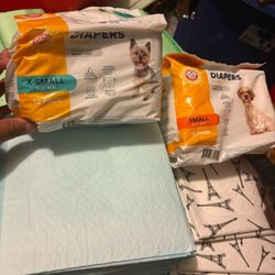 Small, X-Small dog diapers, Dog pads and big box of dog milk bones