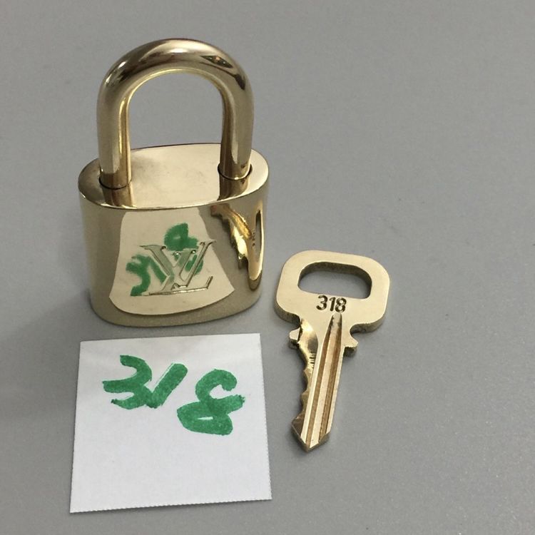 Louis Vuitton Brass Logo Lock and Keys with Box #318 For Sale at 1stDibs