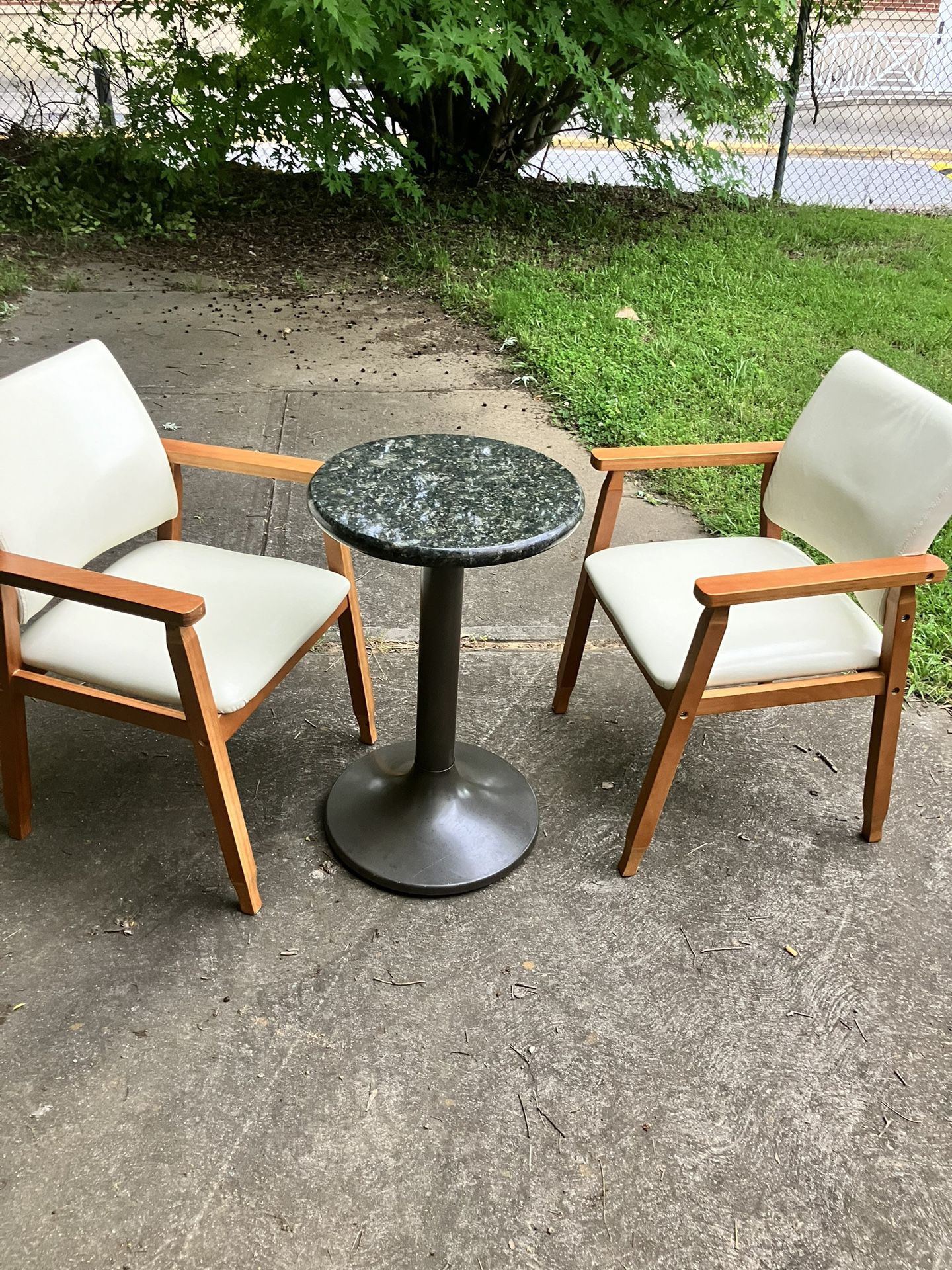 Two Chairs And Granite Pedestal Table