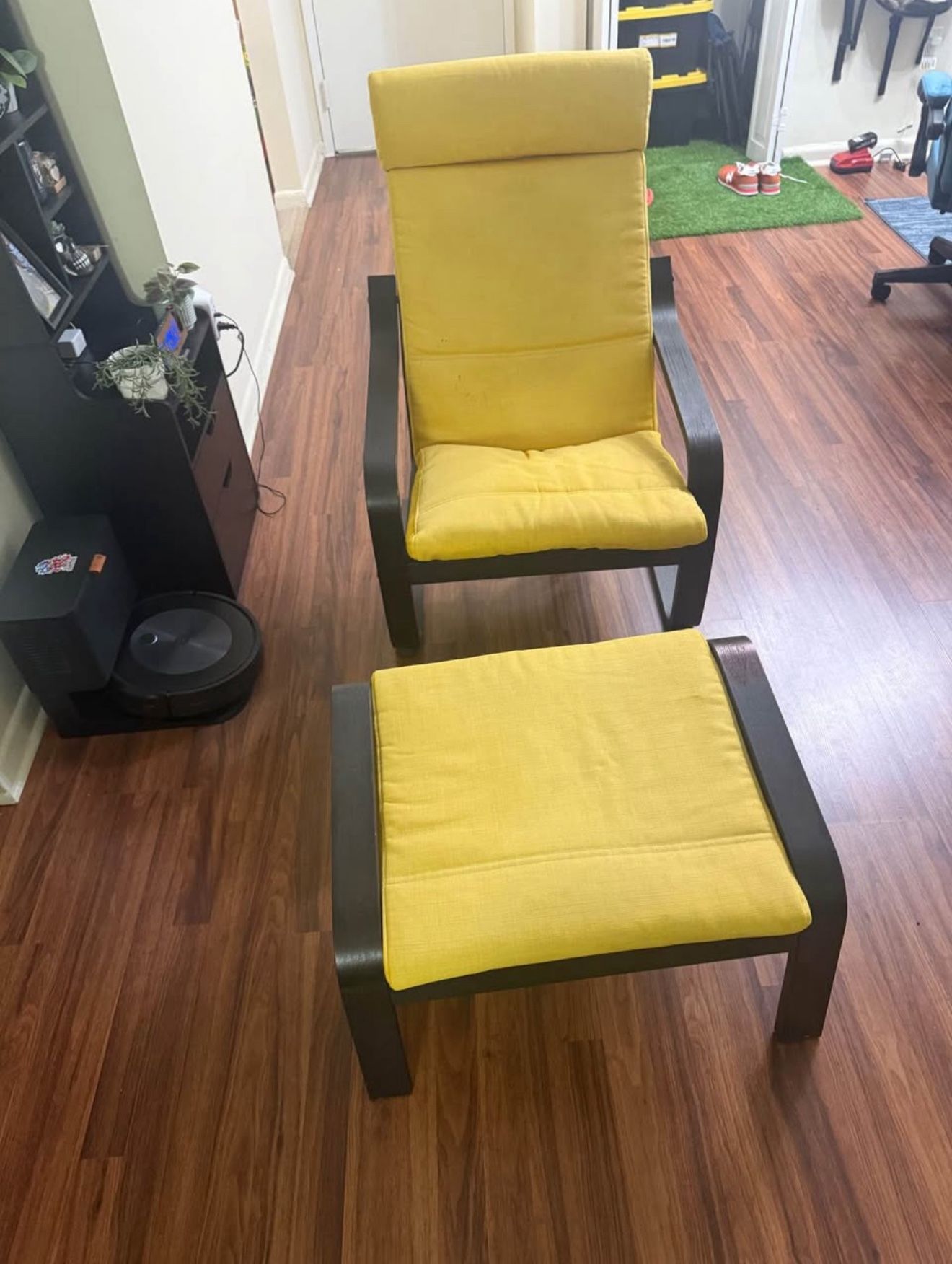 Armchair and ottoman, black-brown/Skiftebo yellow
