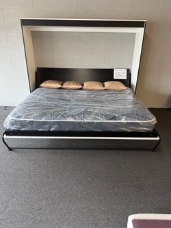 Murphy Bec/Horizontal/Queen Size/New/Clearsnce $1599 includes new queen mattress. $1500 complete. Priced to go. Color white/black trim/stainless steel