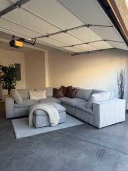Large Gray Modular Sectional Couch With Ottomans