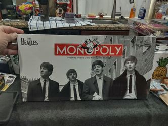 2008 BRAND NEW BEATLES MONOPOLY BOARD GAME. NEVER OPENED.