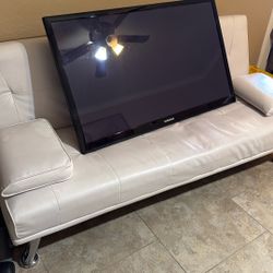 TV And White Futon For Sale 