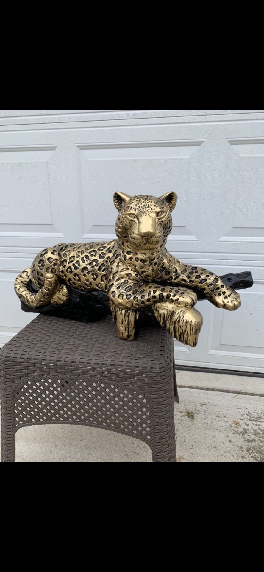 Leopard On The Log Statue