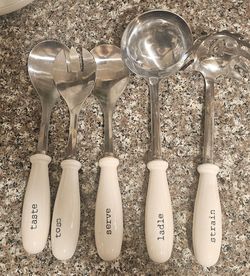 White porcelain serving spoons