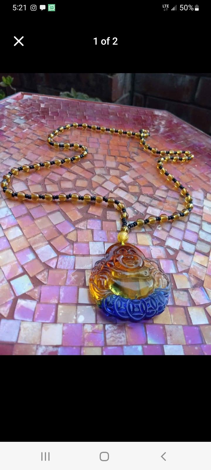 Beautiful Necklace And Charm Buddha