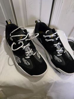 Shaq Raq Low black and white basketball sneakers.