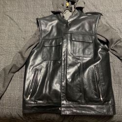 Size Large. Black leather motorcycle vest 