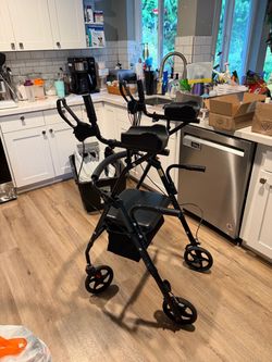 Standup walker with armrests