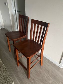 2 wood counter stools