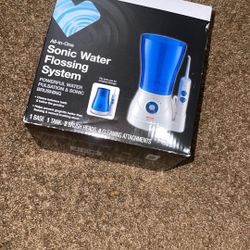 Water Flosser Brand New ($25) Firm