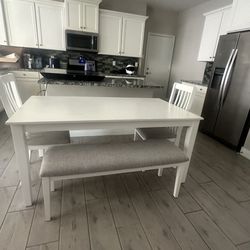 dinning table and bench with chairs