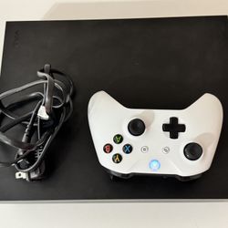 Xbox One X includes 1 Controller HDMI Cable And Power Cord (0 Games Included) 