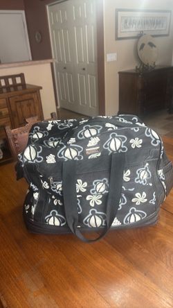 Expanding rolling duffel bag 18x 15