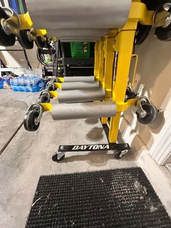 Automotive wheel dolly and stand