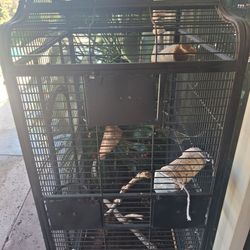 HEAVY DUTY ALL METAL MOBILE BIRD CAGE. 5 ft tall x 32 inches wide x 24 inches deep.