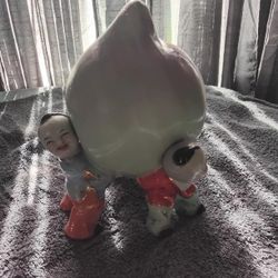 3 Chinese BOYS HOLDING A PEACH