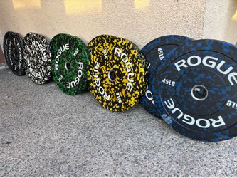 Rogue fleck bumper weights ( LIKE NEW ) 2x45, 2x35, 2x25, 2x15 and 2x10 lbs