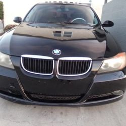 2007 328iI bmw. runs good and tags are paid $2000