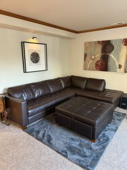 Leather Section With Matching Ottoman 