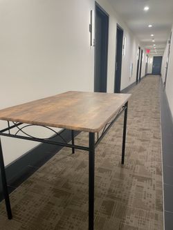 Wooden table, black metal legs