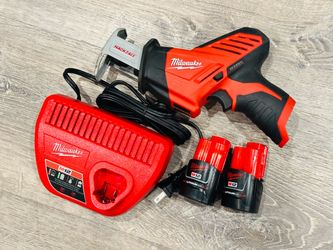 Milwaukee m12 hacksaw with two 2.0 battery’s and charger $100 firm pick up only