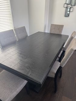 Ashley furniture wooden dining table and 6 pc chair