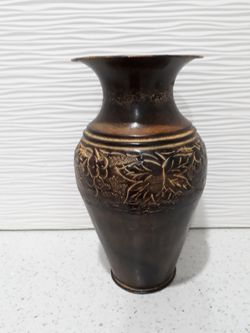 Metal flower vase 10.5 tall x 6 wide. Never used. Antique finish